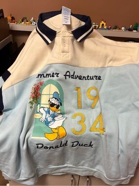 Donald Duck Colorblock Polo Sweatshirt - Light Blue & Cream